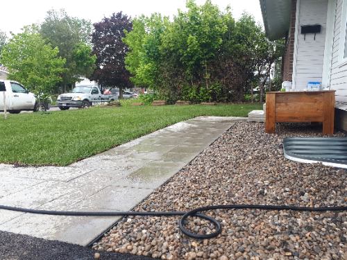 lawn and sod with river rock